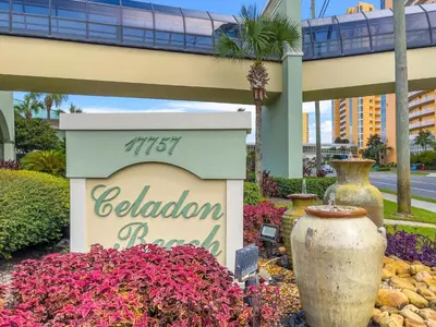 a display of vases and flowers in front of a hotel at Celadon #0606 in Panama City Beach