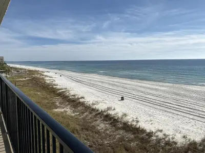 a view of the beach from the balcony of a condo at Seachase E301 by Emerald Coast Retreats in Panama City Beach