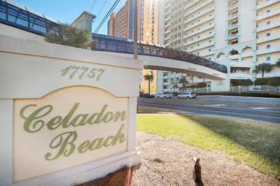 a sign for a hotel with a bridge over a street at Celadon 2005 by Emerald Coast Retreats in Panama City Beach