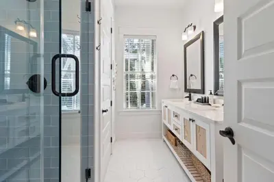 a bathroom with a shower and a sink at Seagrove Escape Refreshed plus Shared Pool in Seagrove Beach