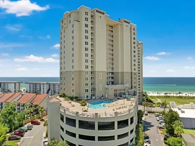 an aerial view of a building with a pool and the ocean at Grand Panama Beach Resort Tower 2 by Panhandle Getaways in Panama City Beach
