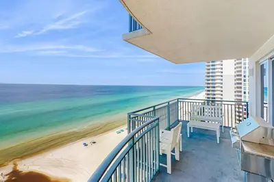 a balcony with a view of the beach at Sterling Breeze 1207 by Emerald Coast Retreats in Panama City Beach
