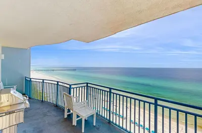 a balcony with a view of the ocean at Sterling Breeze 1207 by Emerald Coast Retreats in Panama City Beach