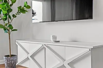 a white counter with a mirror and a plant at Inn at Seacrest Beach 409 in Inlet Beach