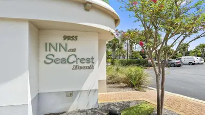 a sign on the side of a building at Inn at Seacrest Beach 408 in Rosemary Beach