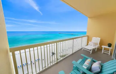 a balcony with a view of the ocean at The Emerald Nest in Panama City Beach
