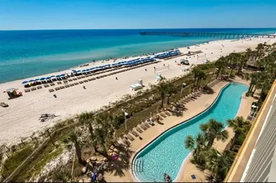 an aerial view of a beach and the ocean at The Emerald Nest in Panama City Beach