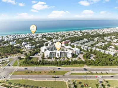 an aerial view of a resort with two hot air balloons at Poolside Paradise in Inlet Beach