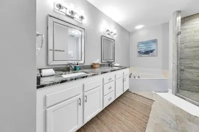 a white bathroom with two sinks and a shower at FL(S) - The Oxford - 10343 E Co Hwy 30A Unit 410 in Inlet Beach