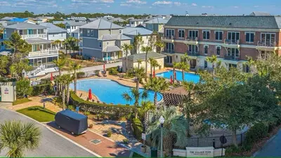 an aerial view of a resort with a swimming pool at FL(S) - The Oxford - 10343 E Co Hwy 30A Unit 410 in Inlet Beach