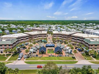an aerial view of a resort with a parking lot at FL(S) - The Oxford - 10343 E Co Hwy 30A Unit 410 in Inlet Beach