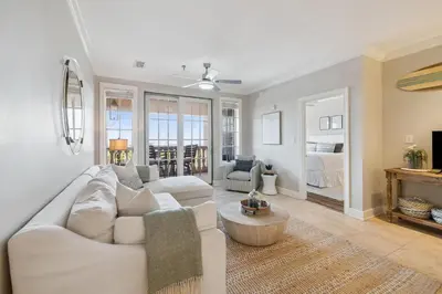 a living room with a white couch and a table at FL(S) - The Oxford - 10343 E Co Hwy 30A Unit 410 in Inlet Beach