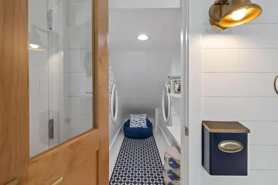 a small bathroom with a shower and a toilet at Salt & Light in Santa Rosa Beach