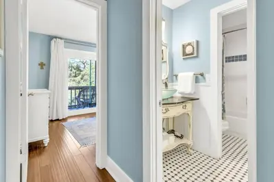 a bathroom with a sink and a mirror at Somewhere in the Sun in Santa Rosa Beach