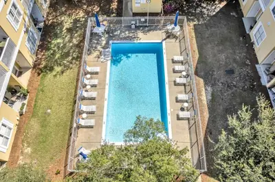 an overhead view of a swimming pool in a apartment at Coastside in Santa Rosa Beach