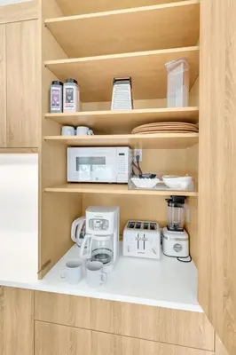 a kitchen with a microwave and other kitchen items at Psalms in Santa Rosa Beach