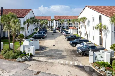 an aerial view of a parking lot at a hotel at Paradise Palms in Santa Rosa Beach