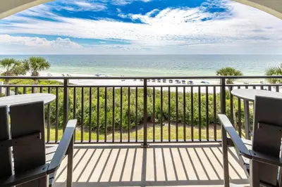 a balcony with a view of the beach at Sea Palms in Santa Rosa Beach