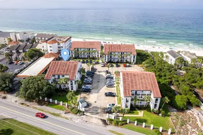 an aerial view of a resort next to the ocean at Palms of Seagrove D5 in Santa Rosa Beach