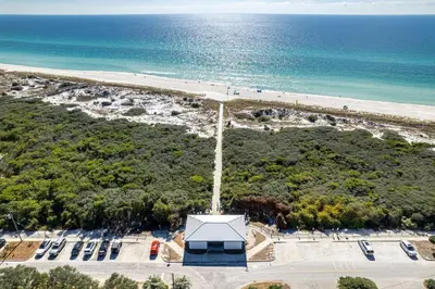 an aerial view of a beach and the ocean at Salty Sons in Inlet Beach