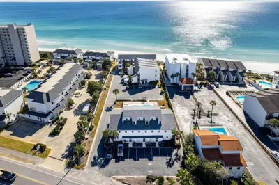 an aerial view of a resort next to the ocean at Seagroovy in Seagrove Beach