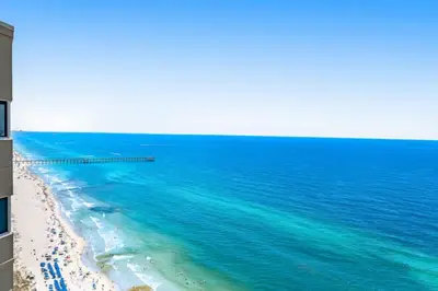 an aerial view of the ocean with a beach at Tidewater 3006 by Emerald Cost Retreats in Panama City Beach