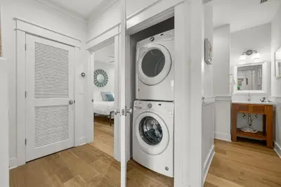 a white laundry room with a washer and dryer at Sweet Sea-esta on 30A in Inlet Beach