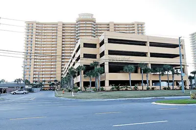 an empty parking lot in front of a large building at Treasure Island 511 in Panama City Beach