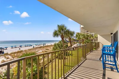 a balcony with a view of the beach at Commodore 0201 in Panama City Beach