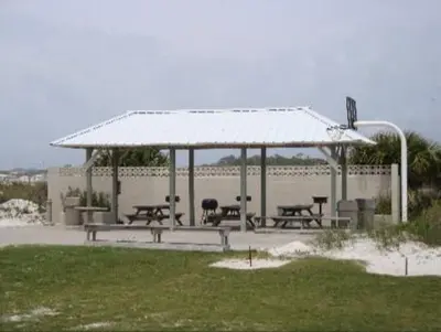 a gazebo with picnic tables and benches in a park at Sand, Sea & Air at Pinnacle Port A-301 in Panama City Beach