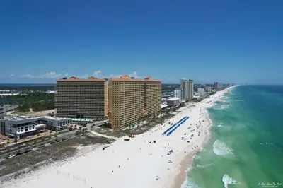 an aerial view of a beach with buildings and the ocean at Beautiful Resort Condo Panama City Beach King Bed in Panama City Beach
