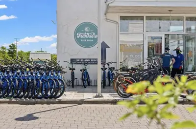 a group of bikes parked in front of a store at Book Me Baby Big Chill in Prominence Golf Cart Included in Inlet Beach