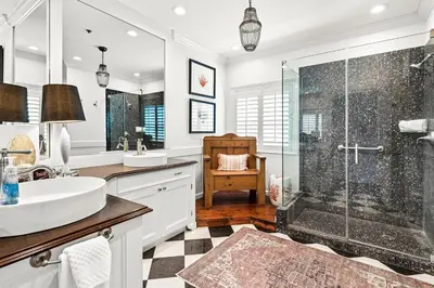 a bathroom with a shower and a sink at 4 BR GULF Front Condo, Bikes, & Community Pool in Seagrove Beach