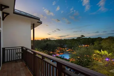 a balcony with a view of a garden at 30a Seagrove Beach Condo with Gulf & Lake Views in Santa Rosa Beach