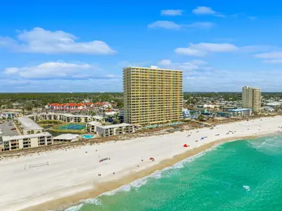 an aerial view of a beach and buildings at Turtle Cove at Sugar Beach #E16 by Nautical Properties Vacation Rentals in Panama City Beach