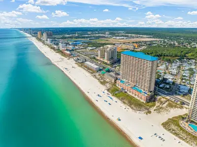 an aerial view of a beach and the ocean at Music City Flamingo at Sunrise Beach Resort #705 by Nautical Properties in Panama City Beach