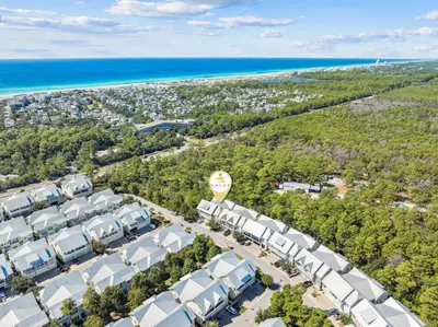 an aerial view of a resort with the ocean at Sun and Sand for 6 - 167 Milestone Dr Unit C in Inlet Beach