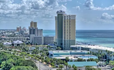 a view of a city with the ocean and buildings at Relaxing 2nd-Floor Laketown Wharf Condo Overlooking the Lake in Panama City Beach