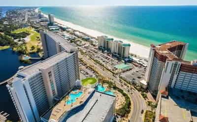 an aerial view of a resort with the beach and buildings at Relaxing 2nd-Floor Laketown Wharf Condo Overlooking the Lake in Panama City Beach