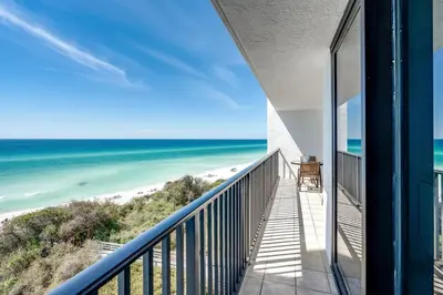 a balcony with a view of the beach at Book Me Baby! License to Chill One Seagrove Place in Seagrove Beach