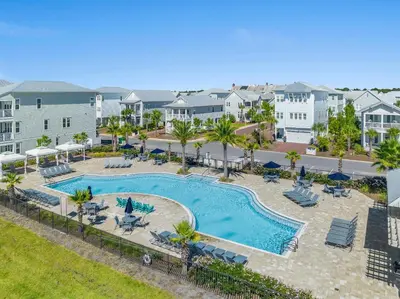 an aerial view of a swimming pool at a resort at Prominence on 30A Pet Friendly Rentals by Panhandle Getaways in Watersound Beach