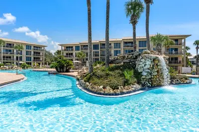 a pool at a resort with a water slide at High Pointe Resort Unit 44E in Inlet Beach