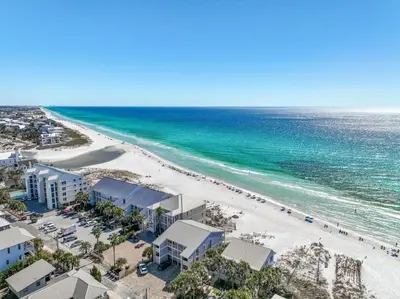 an aerial view of a beach with buildings and the ocean at Book Me Baby! You are in Luck! I Am Gulf Front! in Santa Rosa Beach