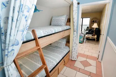 a couple of bunk beds in a room at Summit 903 in Panama City Beach