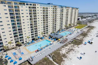 an aerial view of a resort with a pool and beach at Regency 1023 in Panama City Beach