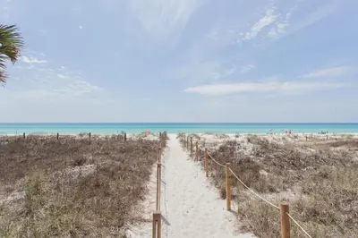 a path through the sand at the beach at Palms A4 Main in Panama City Beach