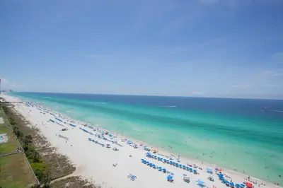 an overhead view of a beach with people and the ocean at Ocean Ritz 1501 in Panama City Beach