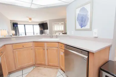 a kitchen with a sink and a dishwasher at Summerhouse 1005a in Panama City Beach