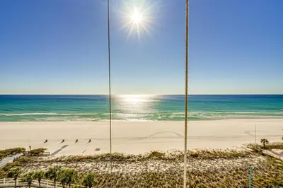 a view of the beach and the ocean from a building at Walk to Pools and Outdoor Bar! Oceanfront PCB Gem in Panama City Beach