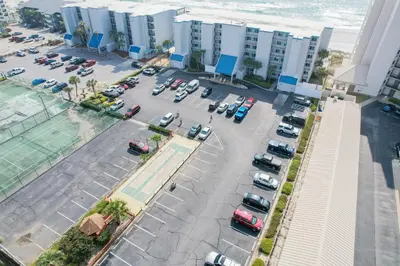 an aerial view of a parking lot with cars at Mariner West 508 in Panama City Beach